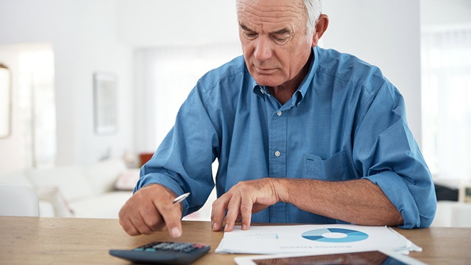 older_man_calculating_numbers_for_retirement